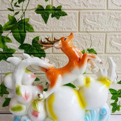 TƯỢNG HƯƠU VÀ HỒ LÔ VÀNG